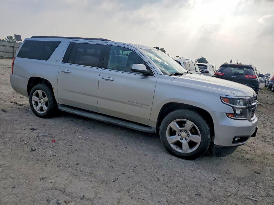 Photo 4 from auction – 2015 CHEVROLET SUBURBAN with VIN 1GNSKJKC8FR231384