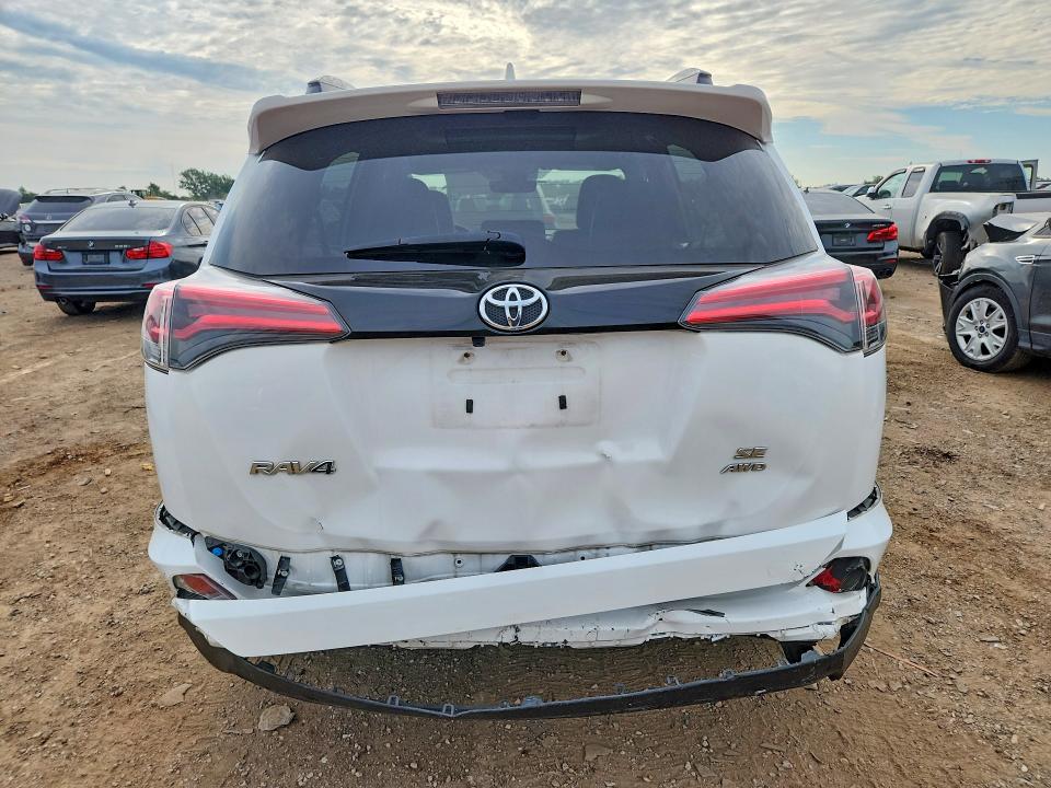 Photo 6 from auction – 2018 TOYOTA RAV4 with VIN 2T3JFREV8JW736516