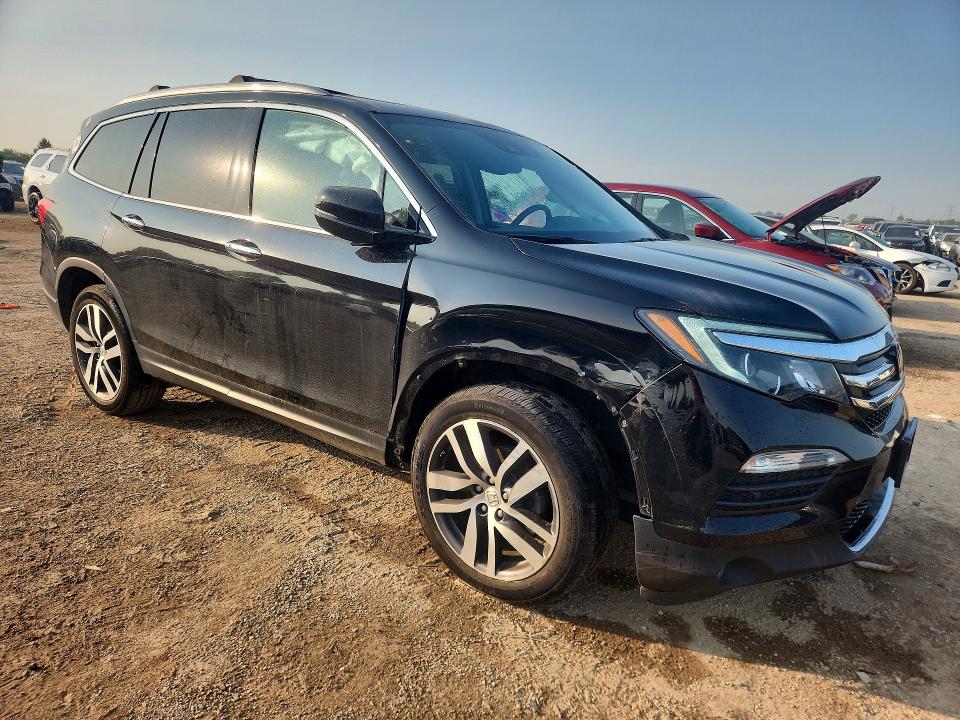 Photo 4 from auction – 2016 HONDA PILOT with VIN 5FNYF6H02GB041671