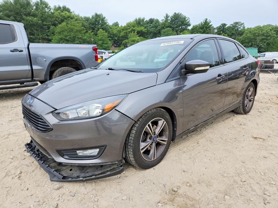 FORD FOCUS 2017 with VIN 1FADP3FE3HL297394 - Photo from auction