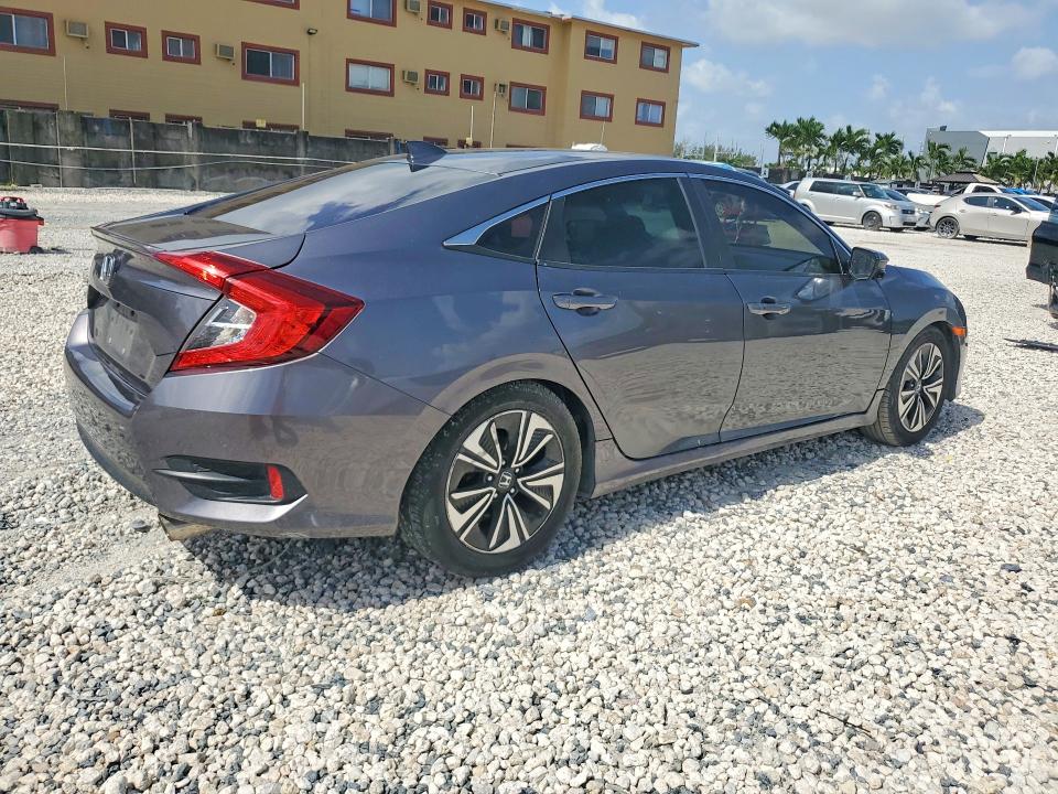 Photo 3 from auction – 2016 HONDA CIVIC with VIN 19XFC1F33GE003727