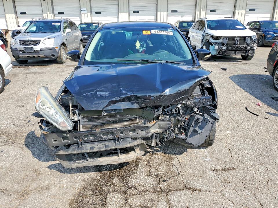 Photo 5 from auction – 2016 FORD FOCUS with VIN 1FADP3F24GL359048