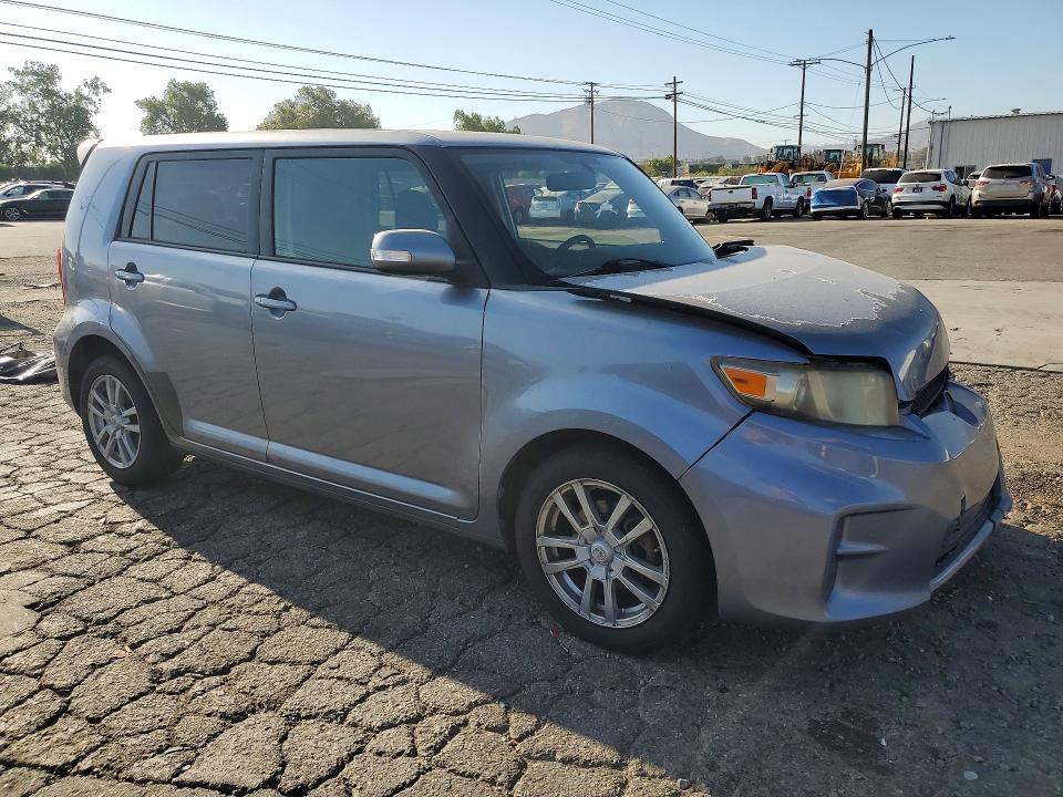 Photo 4 from auction – 2011 TOYOTA SCION with VIN JTLZE4FE4B1131646