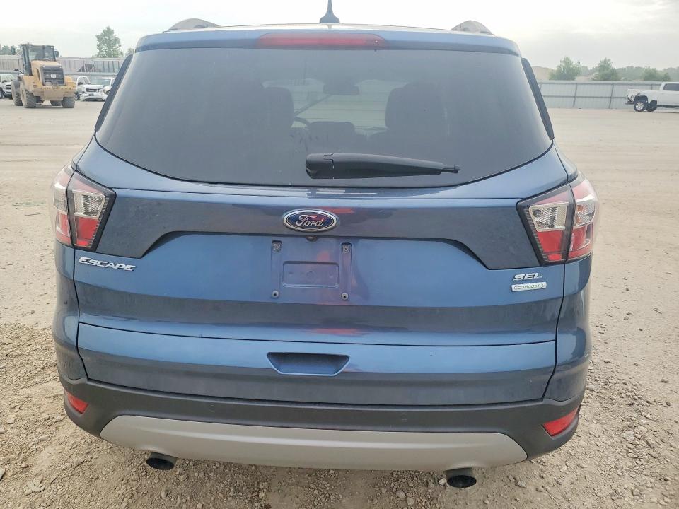 Foto 6 de la subasta – 2018 FORD ESCAPE con VIN 1FMCU0HD0JUA55241