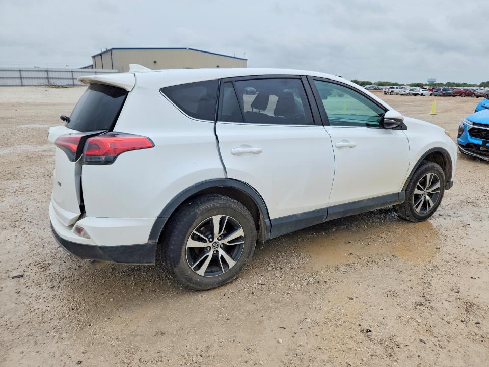 Photo 3 from auction – 2018 TOYOTA RAV4 with VIN 2T3WFREV4JW467761