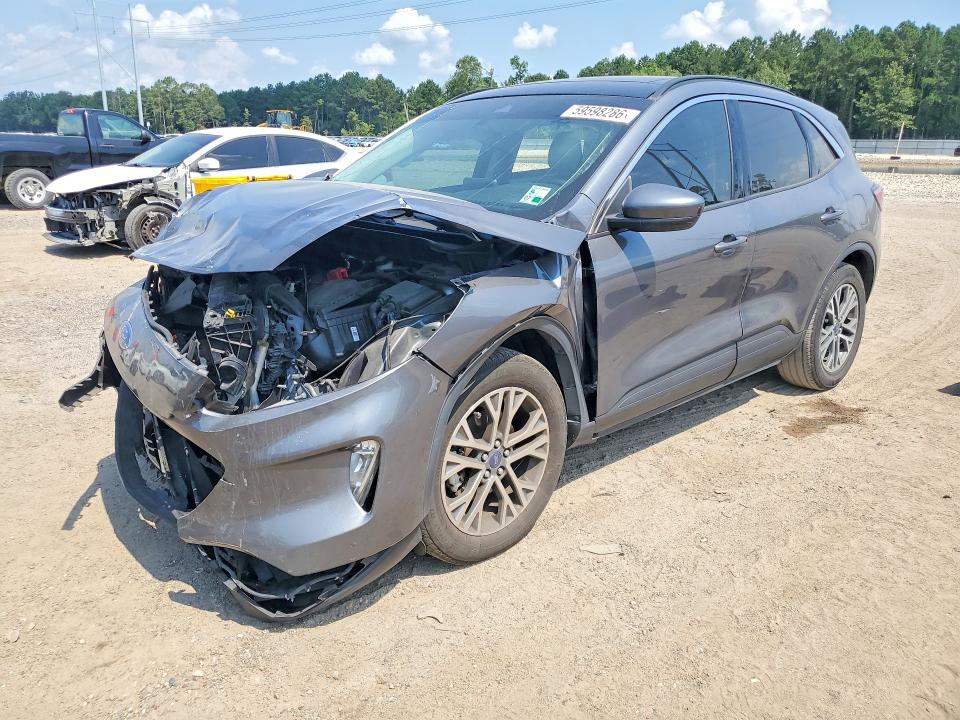 FORD ESCAPE 2021 with VIN 1FMCU0H61MUB00709 - Photo from auction
