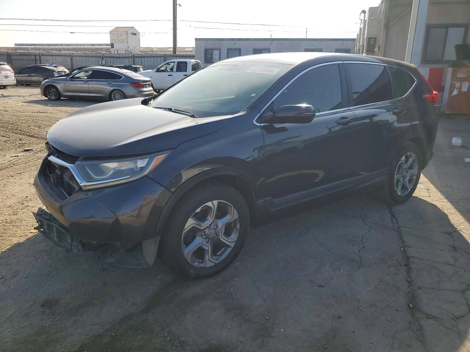 HONDA CR-V 2017 with VIN 7FARW1H88HE011464 - Photo from auction