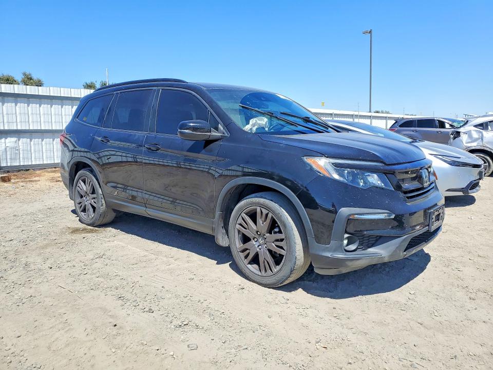Photo 4 from auction – 2022 HONDA PILOT with VIN 5FNYF5H39NB032256