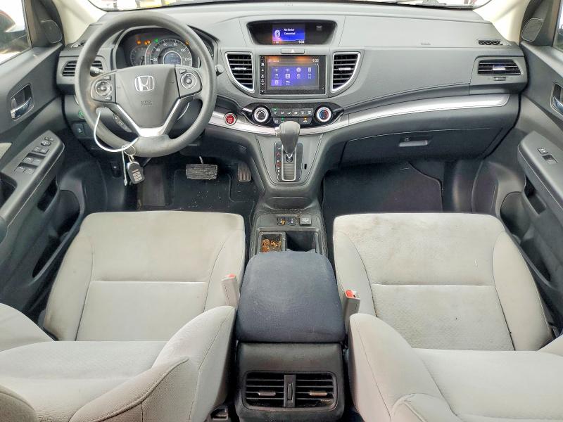Photo 8 from auction – 2015 HONDA CR-V with VIN 2HKRM3H53FH538345