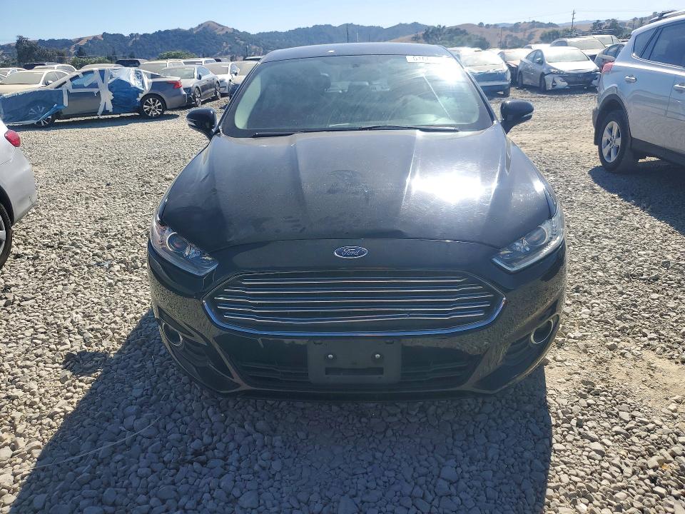Photo 5 from auction – 2016 FORD FUSION with VIN 3FA6P0H92GR186956