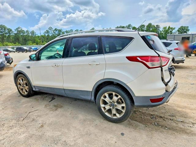 Photo 2 from auction – 2014 FORD ESCAPE with VIN 1FMCU0J95EUD70242