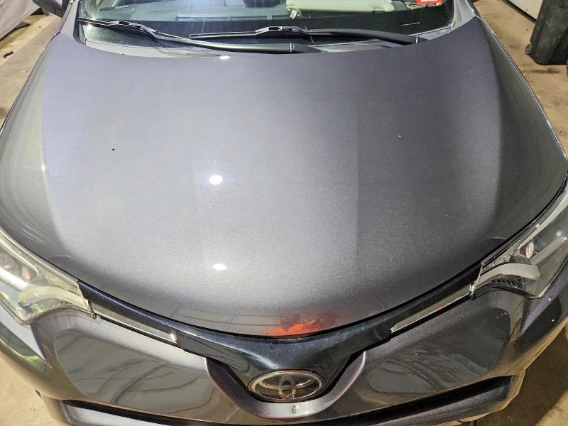 Photo 12 from auction – 2018 TOYOTA RAV4 with VIN JTMRFREV4JJ735820