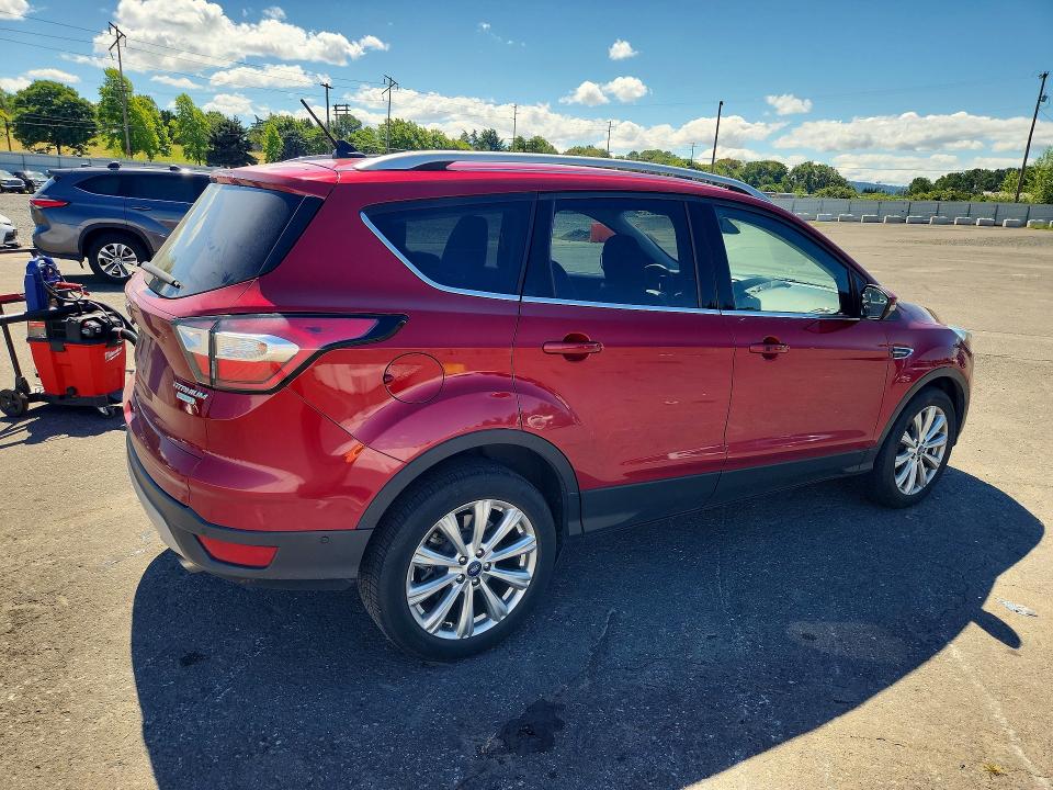 Photo 3 from auction – 2018 FORD ESCAPE with VIN 1FMCU0J95JUA04792