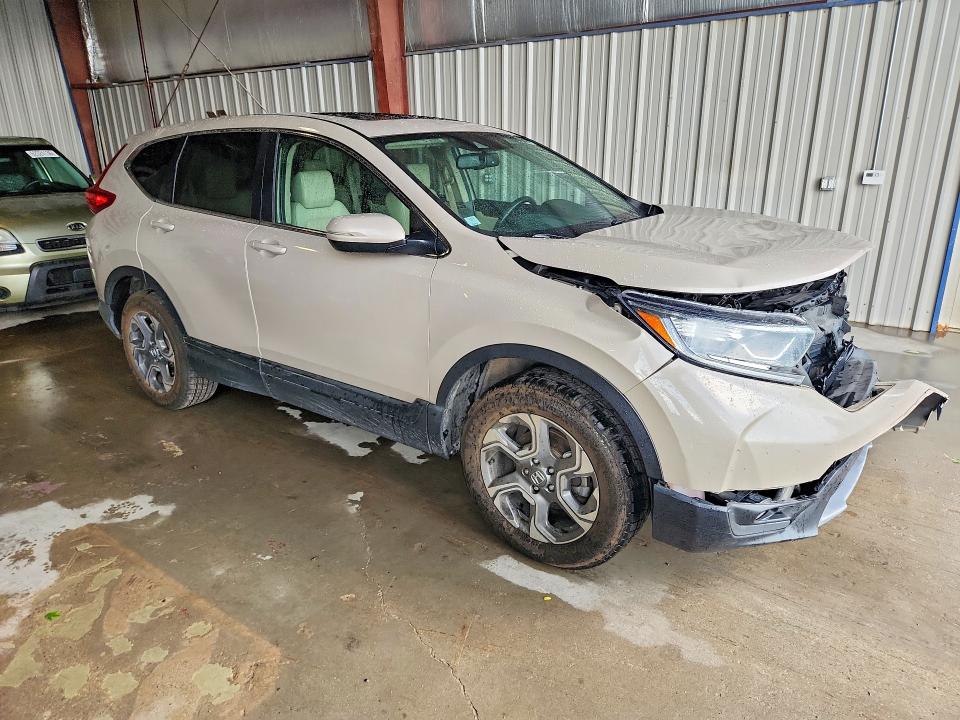 Photo 4 from auction – 2017 HONDA CR-V with VIN 5J6RW2H80HL077628