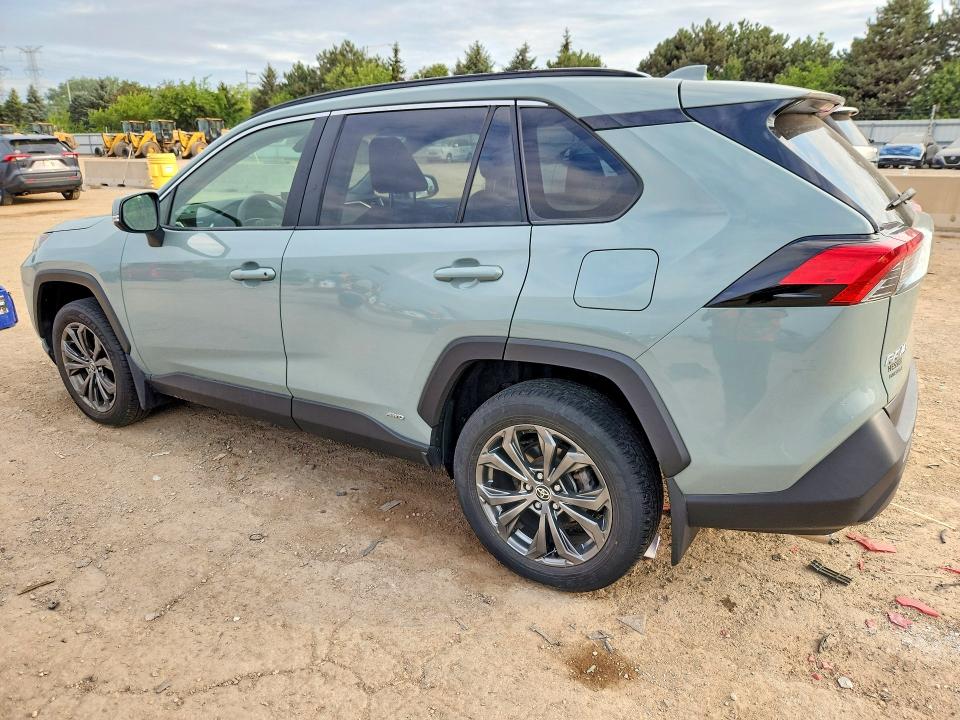 Photo 2 from auction – 2022 TOYOTA RAV4 with VIN JTMB6RFV8ND067282