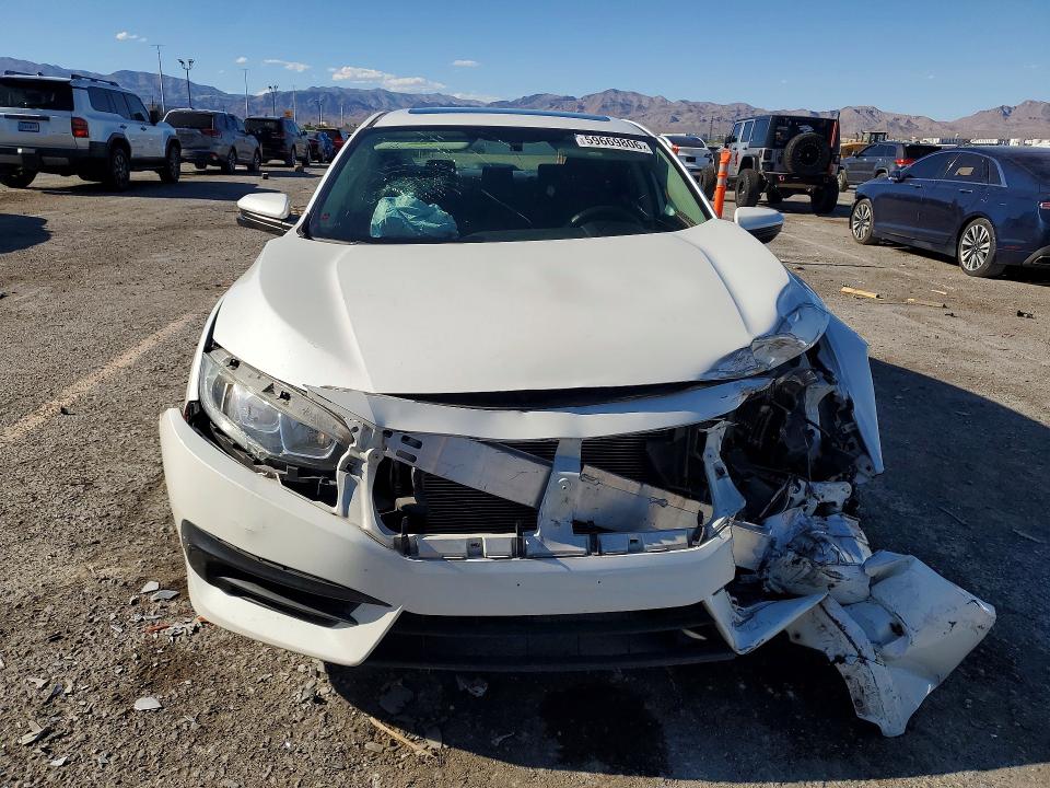Photo 5 from auction – 2018 HONDA CIVIC with VIN 2HGFC2F71JH577250
