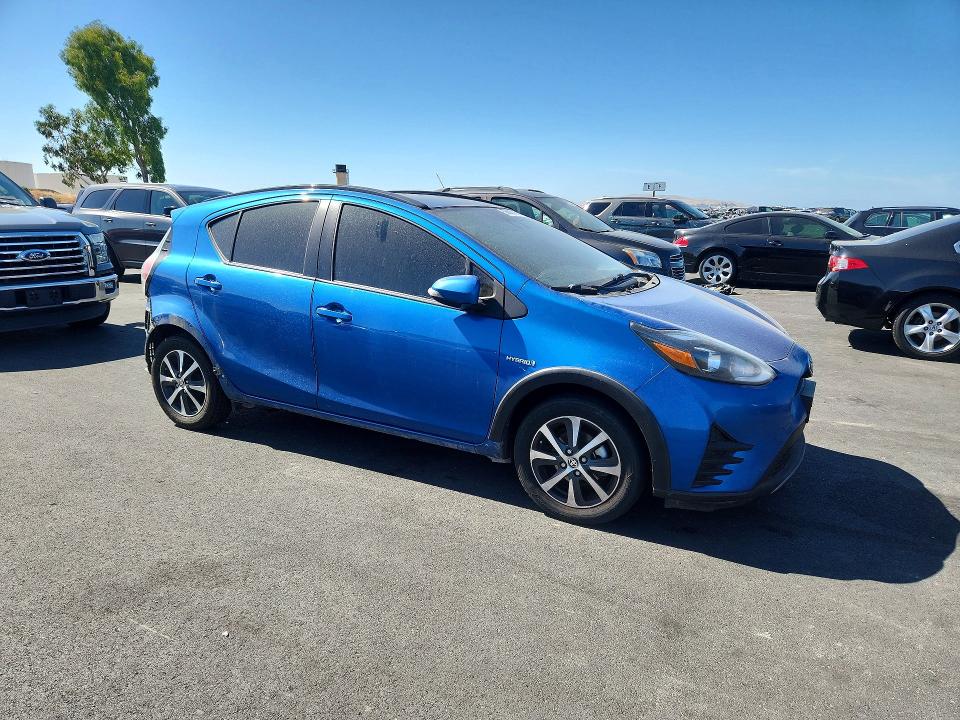 Photo 4 from auction – 2018 TOYOTA PRIUS C with VIN JTDKDTB37J1606591