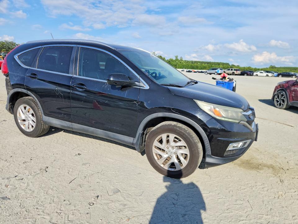 Photo 4 from auction – 2015 HONDA CR-V with VIN 2HKRM4H7XFH656593
