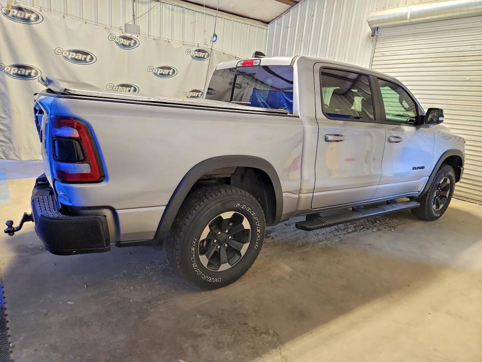 Снимка 3 от търг – 2020 RAM 1500 с VIN 1C6RRELT2LN176580