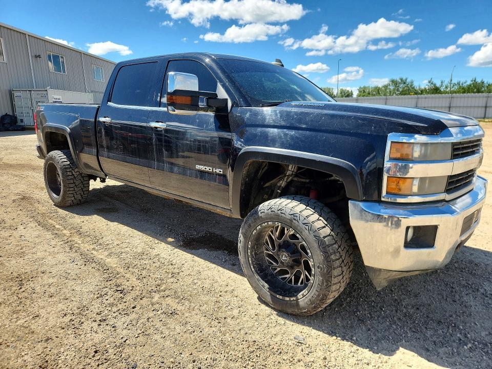 Photo 4 from auction – 2015 CHEVROLET SILVERADO with VIN 1GC1KWE80FF537571