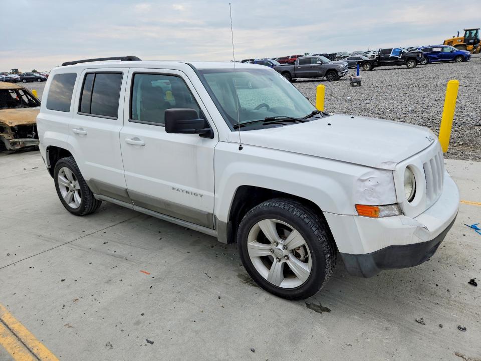 Photo 4 from auction – 2011 JEEP PATRIOT with VIN 1J4NT1GA8BD104145