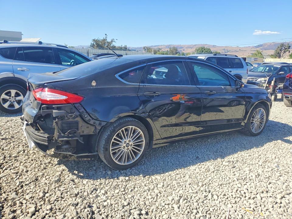 Photo 3 from auction – 2016 FORD FUSION with VIN 3FA6P0H92GR186956