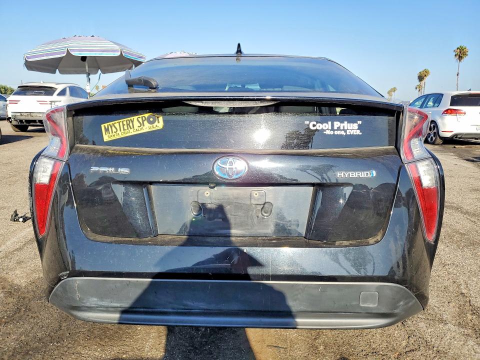 Photo 6 from auction – 2016 TOYOTA PRIUS with VIN JTDKBRFUXG3010786