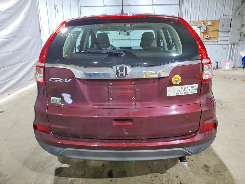 Photo 6 from auction – 2015 HONDA CR-V with VIN 2HKRM3H37FH516301