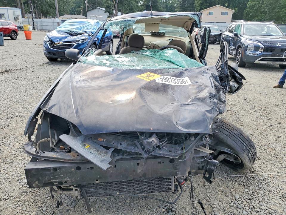 Photo 5 from auction – 2006 FORD FOCUS with VIN 1FAFP34N76W205520