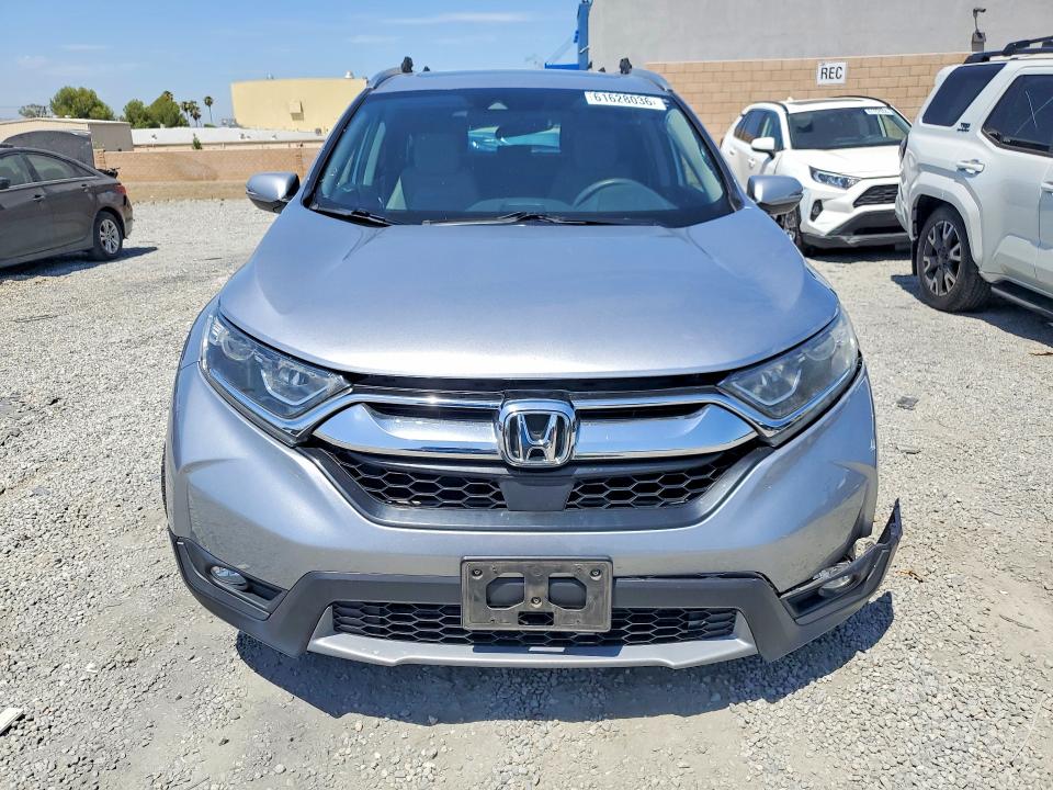 Photo 5 from auction – 2017 HONDA CR-V with VIN 7FARW1H59HE005582