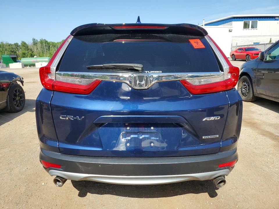 Photo 6 from auction – 2018 HONDA CR-V with VIN 2HKRW2H99JH144610