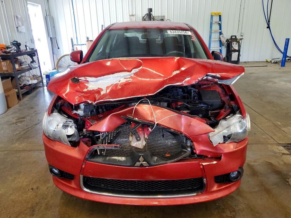 Photo 5 from auction – 2015 MITSUBISHI LANCER with VIN JA32V2FW8FU021826