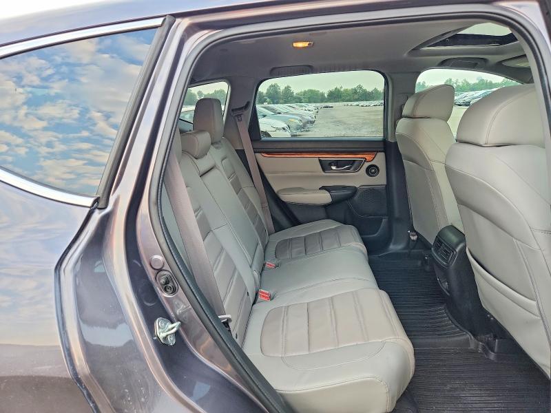 Photo 11 from auction – 2018 HONDA CR-V with VIN 7FARW2H84JE082642