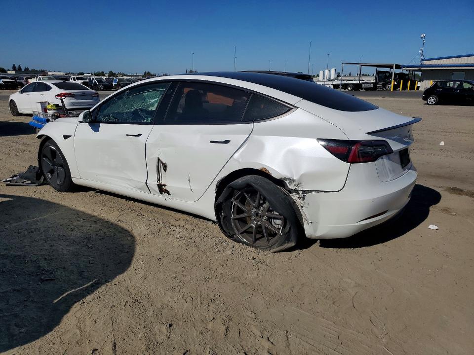 Photo 2 from auction – 2021 TESLA MODEL 3 with VIN 5YJ3E1EA5MF985585