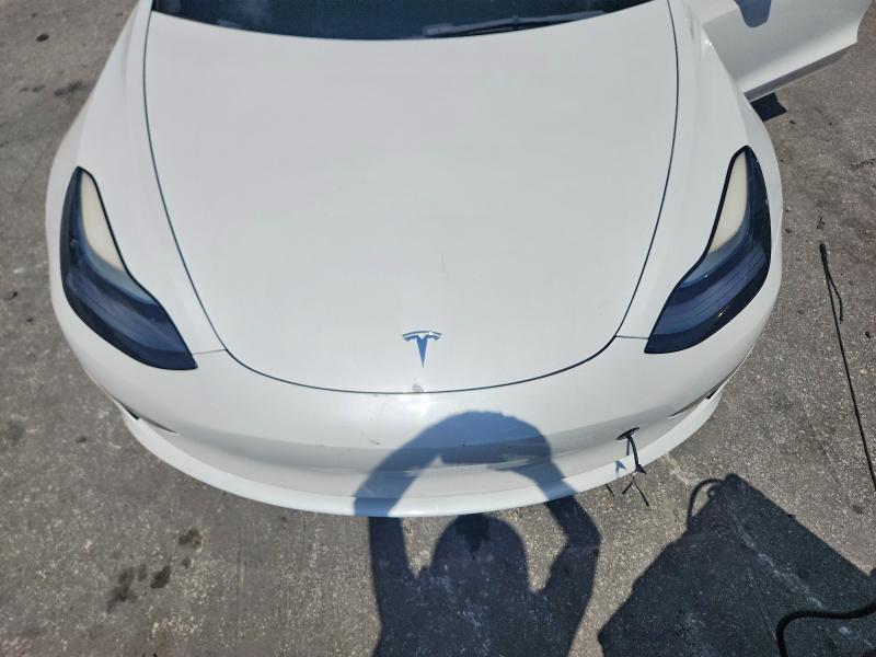 Photo 11 from auction – 2021 TESLA MODEL 3 with VIN 5YJ3E1ECXMF088456