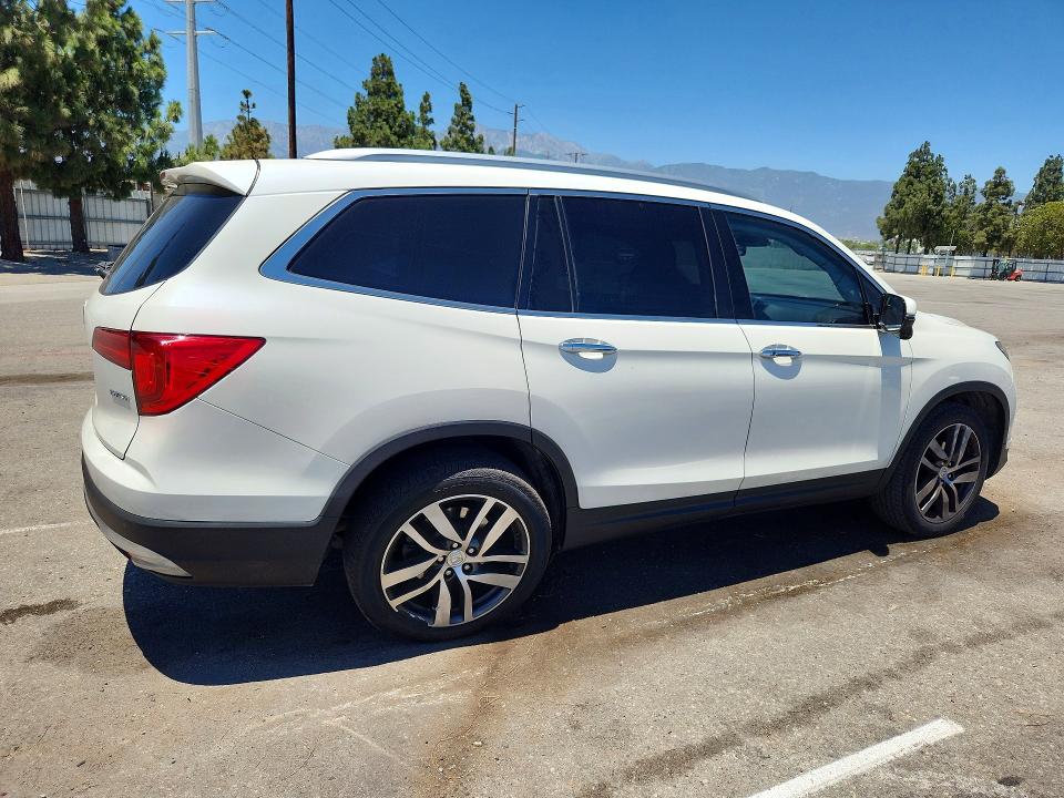 Photo 3 from auction – 2018 HONDA PILOT with VIN 5FNYF5H95JB022628