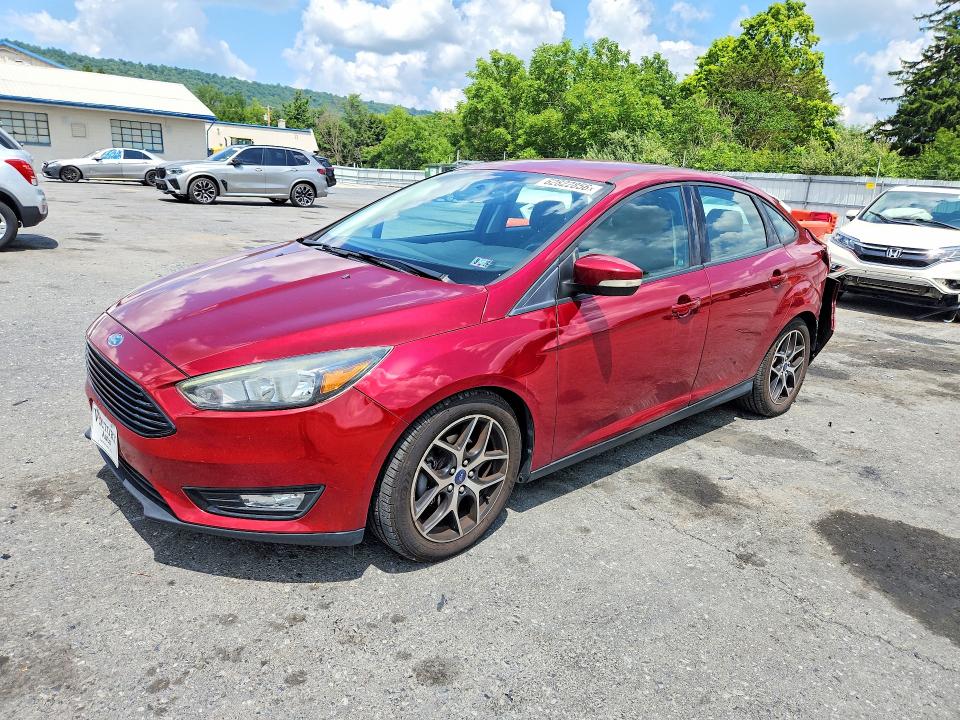 FORD FOCUS 2017 with VIN 1FADP3FE2HL289531 - Photo from auction