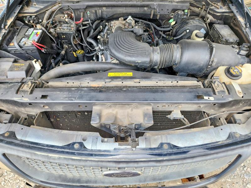 Photo 11 from auction – 2000 FORD F150 with VIN 1FTRX18W4YNA57639