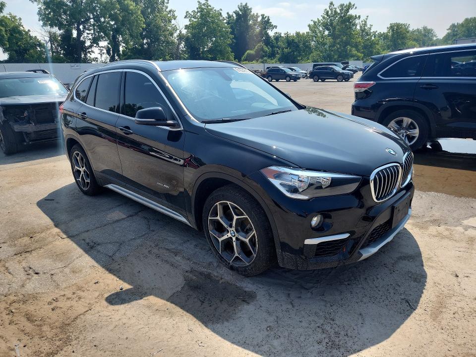 Photo 4 from auction – 2016 BMW X1 with VIN WBXHT3C37G5E50328
