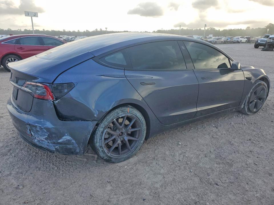 Photo 3 from auction – 2023 TESLA MODEL 3 with VIN 5YJ3E1EA1PF615710