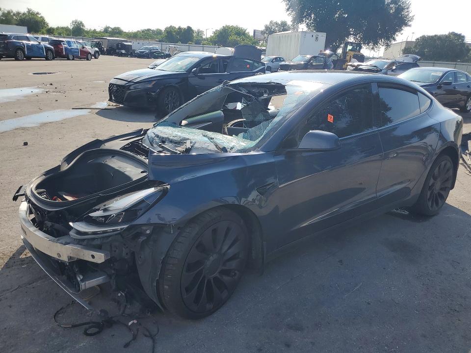 TESLA MODEL 3 2022 with VIN 5YJ3E1ECXNF277514 - Photo from auction