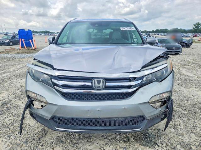 Photo 5 from auction – 2018 HONDA PILOT with VIN 5FNYF5H9XJB007865