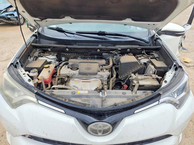 Photo 12 from auction – 2018 TOYOTA RAV4 with VIN 2T3WFREV4JW467761