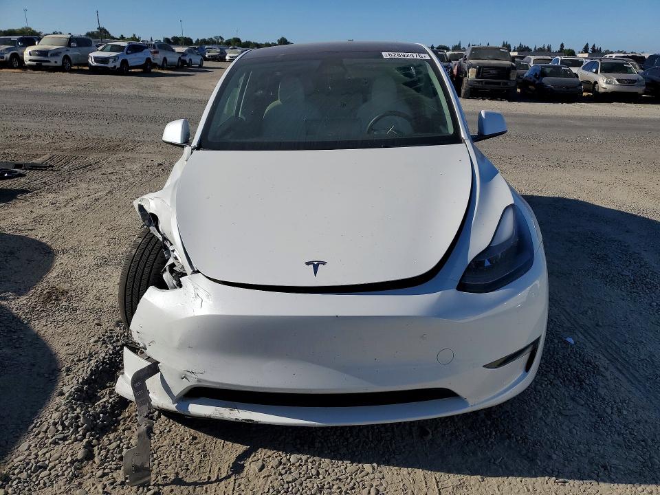 Photo 5 from auction – 2023 TESLA MODEL Y with VIN 7SAYGDEE8PF701250