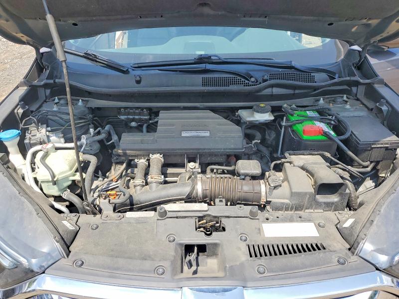 Photo 11 from auction – 2018 HONDA CR-V with VIN 2HKRW2H83JH678550