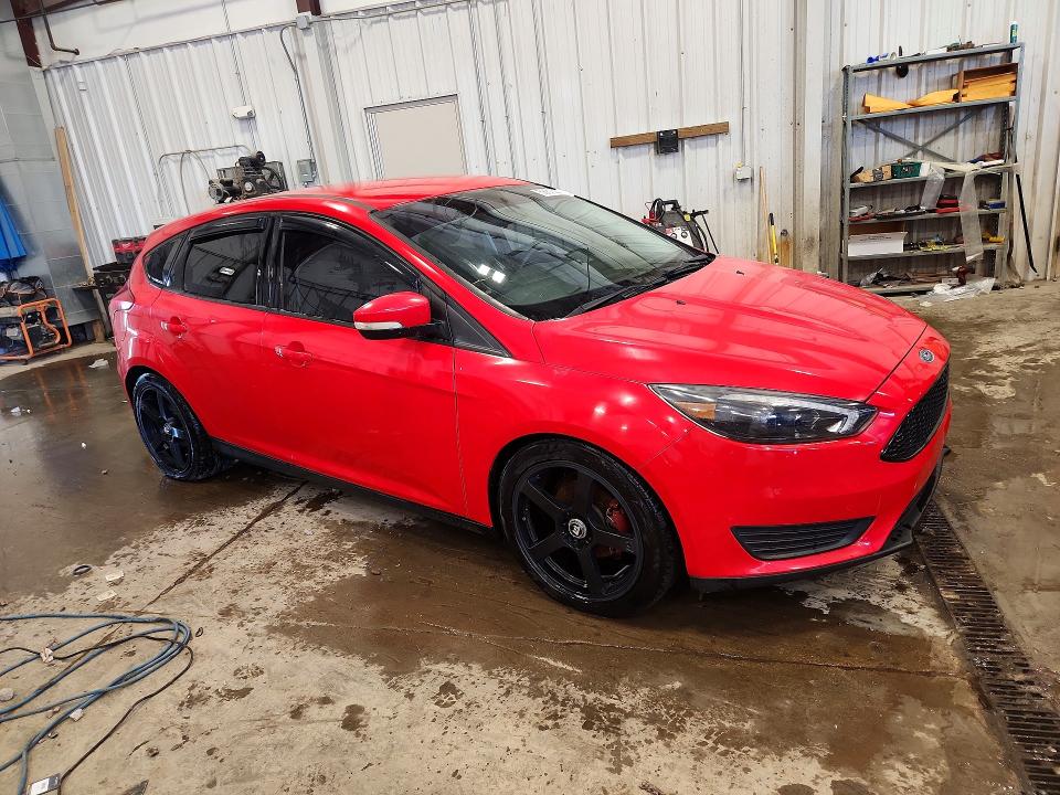Photo 4 from auction – 2015 FORD FOCUS with VIN 1FADP3K29FL215077