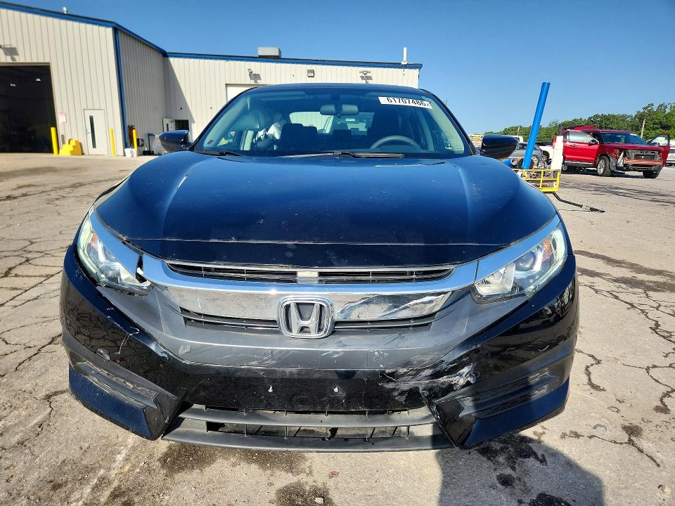 Photo 5 from auction – 2018 HONDA CIVIC with VIN 2HGFC2F50JH583569