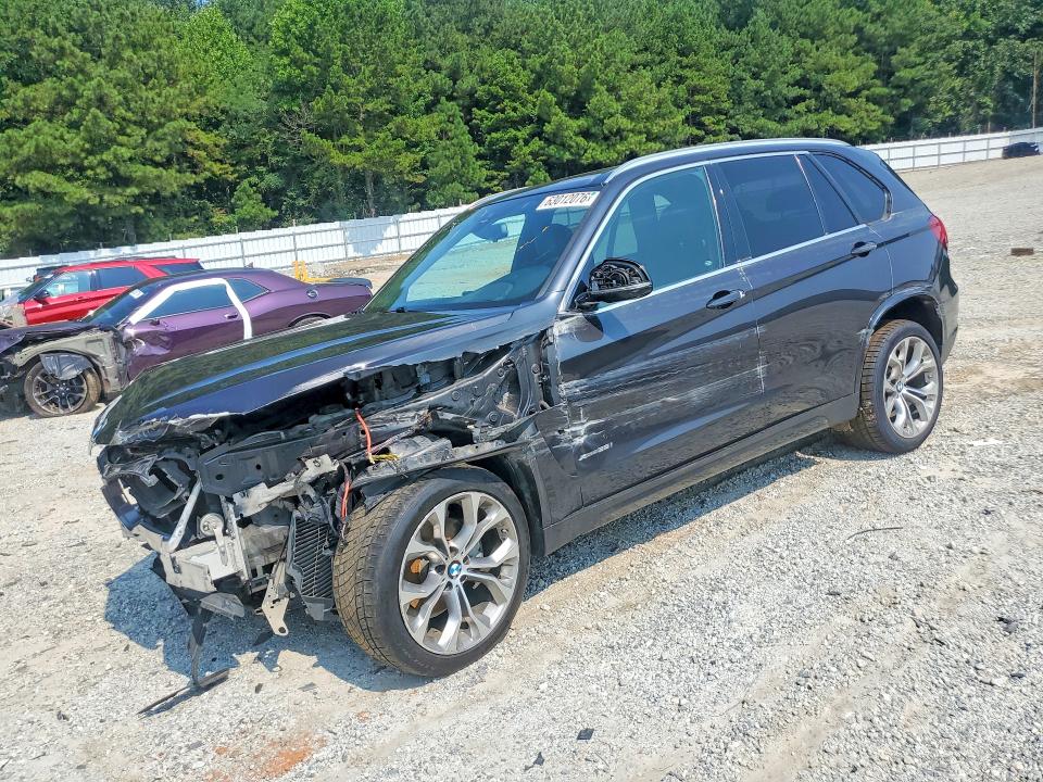 BMW X5 2018 with VIN 5UXKR0C55J0X84679 - Photo from auction