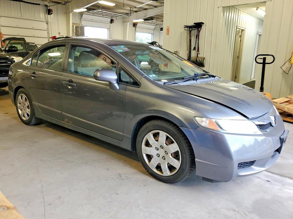 Photo 4 from auction – 2010 HONDA CIVIC with VIN 19XFA1F54AE034046