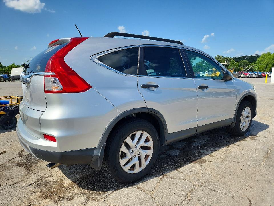 Photo 3 from auction – 2015 HONDA CR-V with VIN 3CZRM3H30FG715502